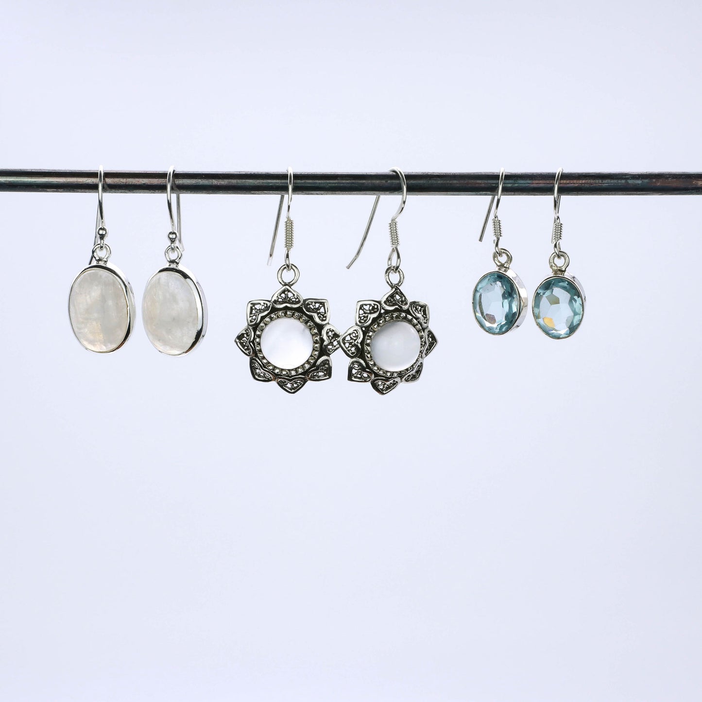 pendiente plata ojo de gato flor 3