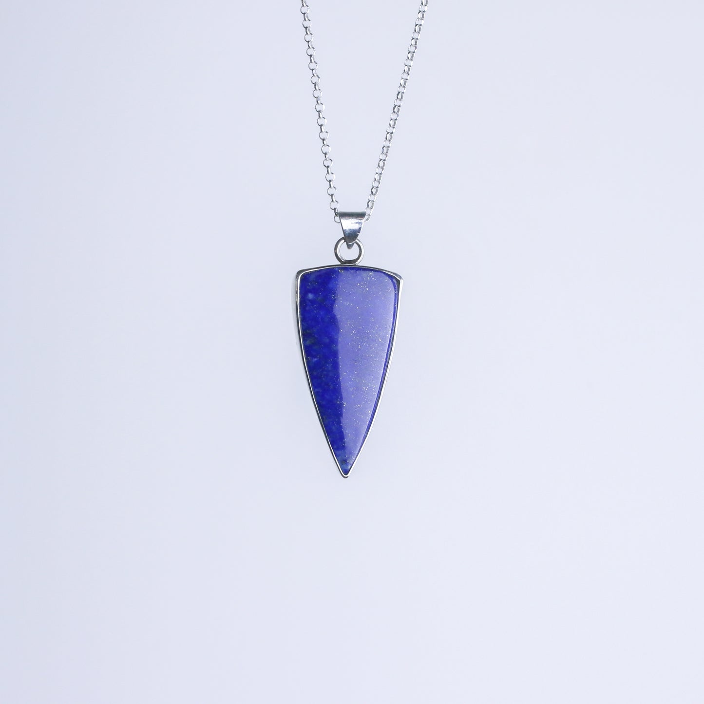 colgante lapislazuli natural sileuta artesania plata luz