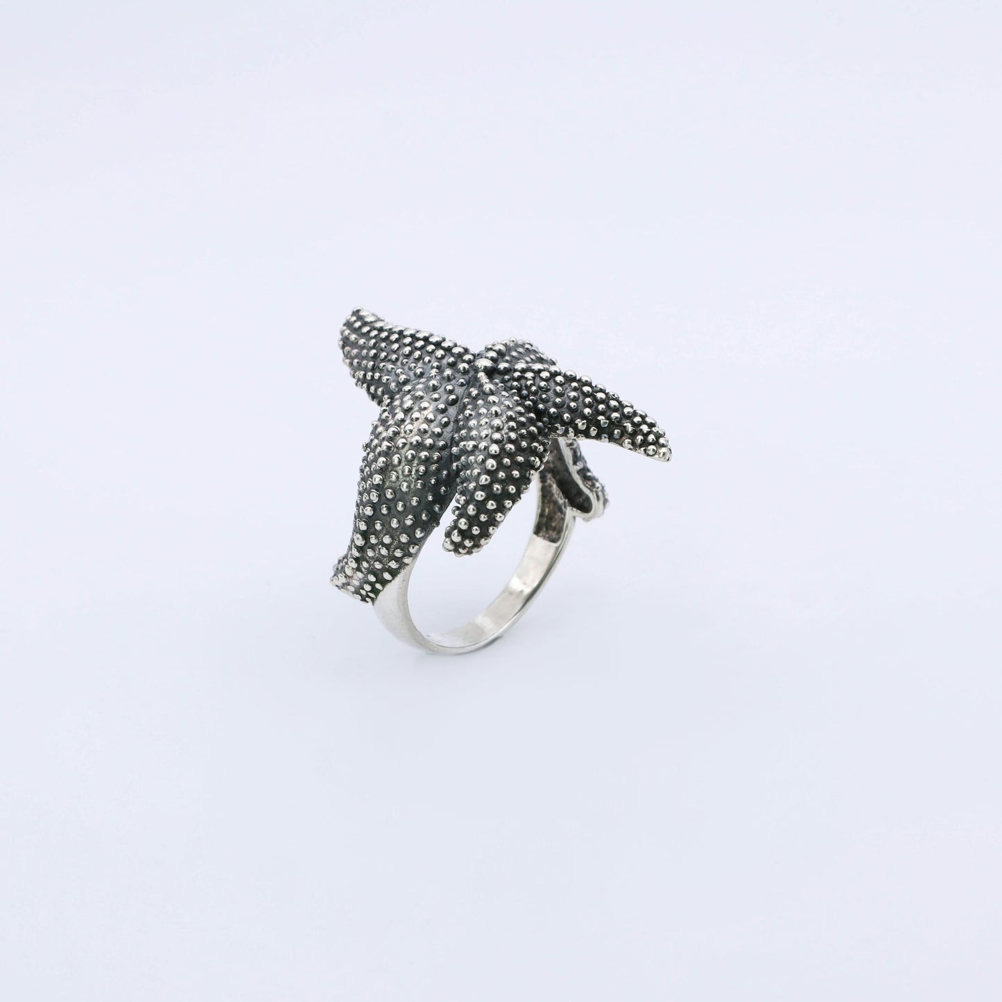 IC: ANILLO PLATA ESTRELLA MAR HOMBRE Y MUJER