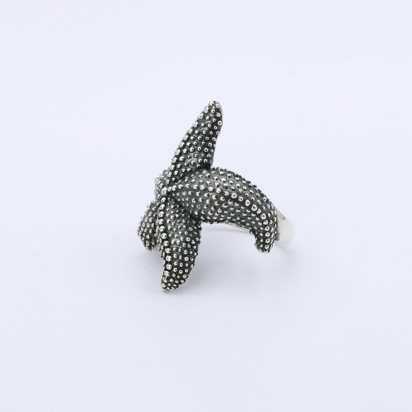 IC: ANILLO PLATA ESTRELLA MAR HOMBRE Y MUJER