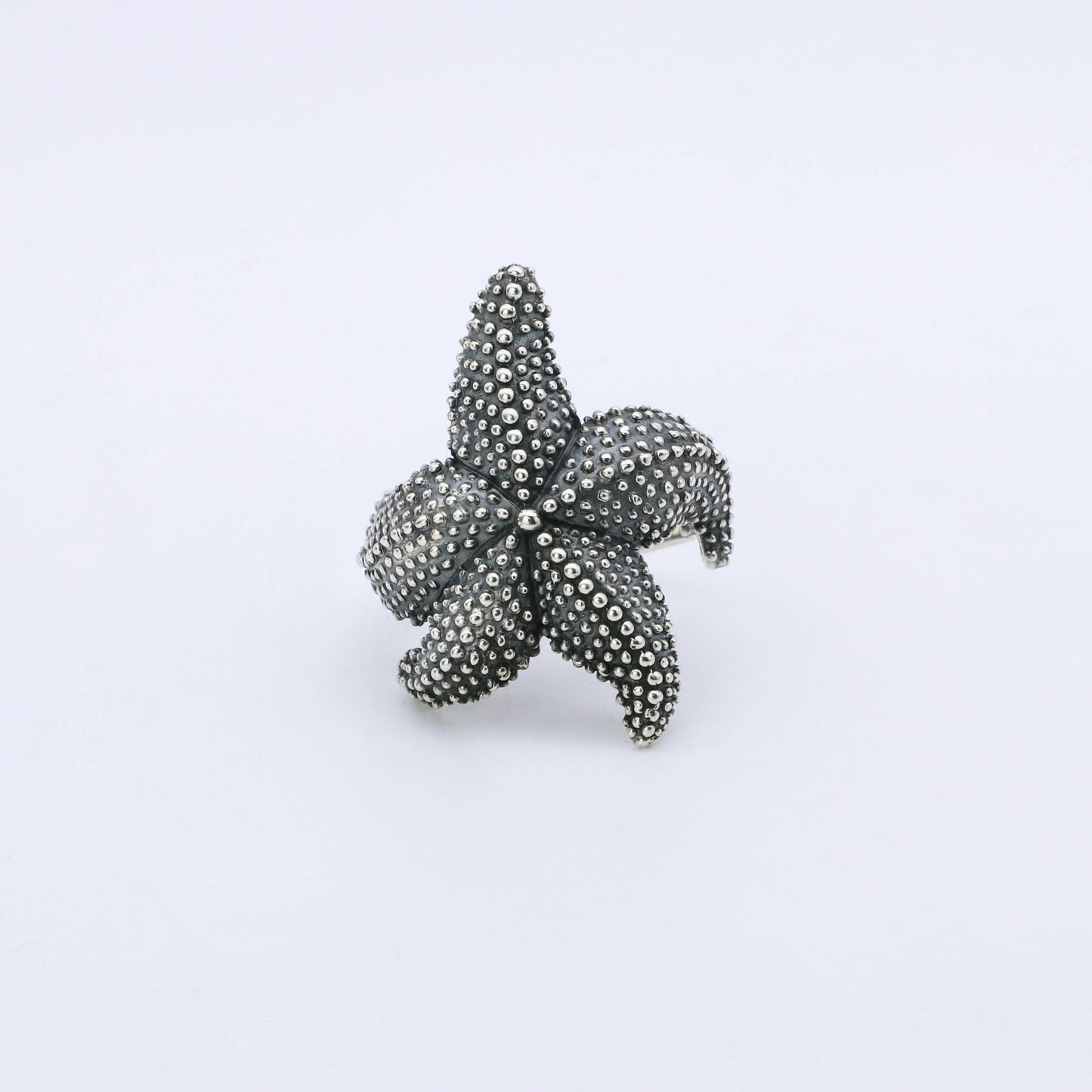 IC: ANILLO PLATA ESTRELLA MAR HOMBRE Y MUJER